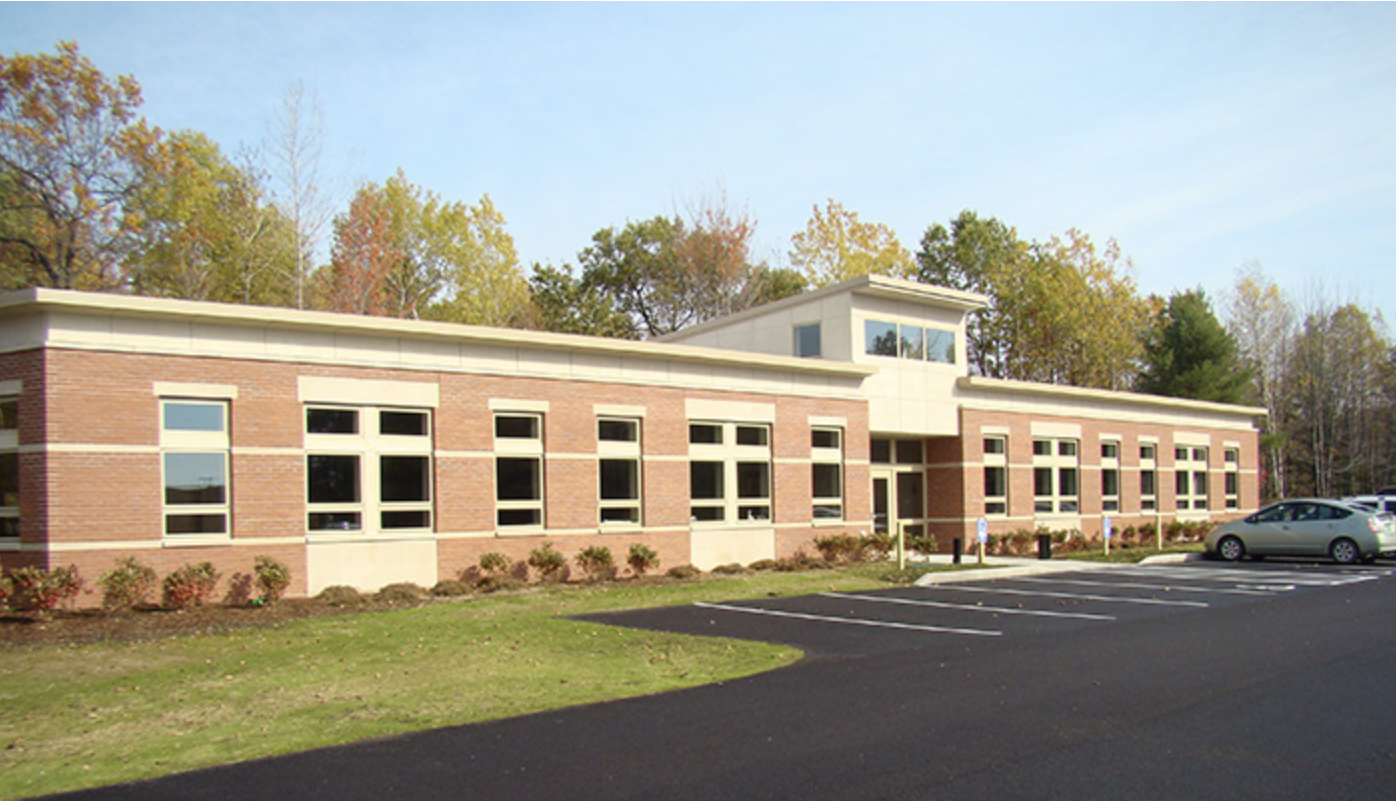 Exterior of the Family First Chiropractic building on a sunny autumn day